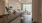 a kitchen with a prep island