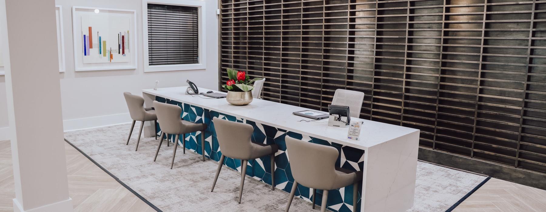 a dining room with a table and chairs