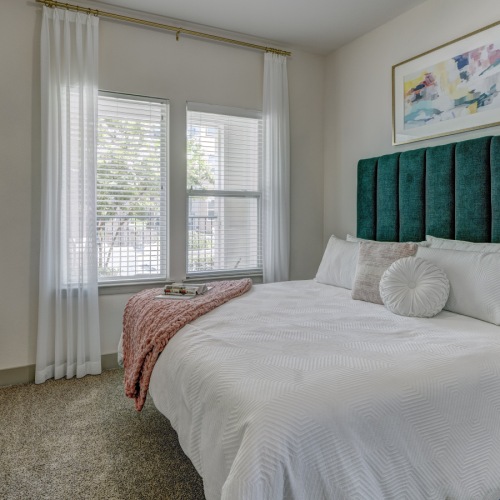 Bedroom Bedroom with queen bed, dresser and nightstands